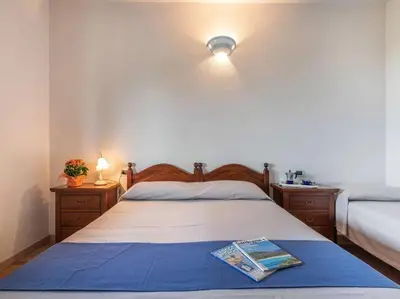Letto o letti in una camera di Holiday retreat near La Caletta beaches