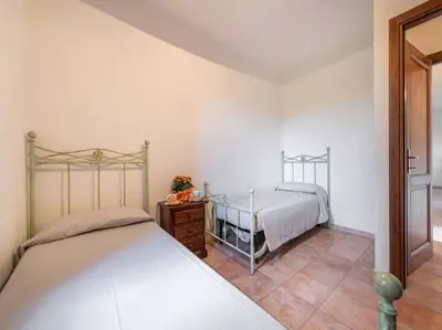Letto o letti in una camera di Holiday retreat near La Caletta beaches