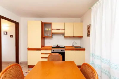 Cucina o angolo cottura di Taverna Perla Marina 3