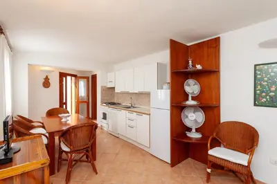 Cucina o angolo cottura di Taverna Perla Marina 4