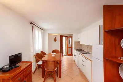 Cucina o angolo cottura di Taverna Perla Marina 4