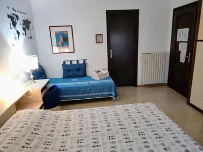 Letto o letti in una camera di Il Coccio