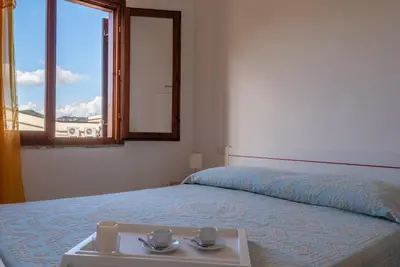 Letto o letti in una camera di Outstanding Residenza Gallura 2 Bedrm T6 sleeps6