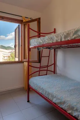 Letto o letti in una camera di Outstanding Residenza Gallura 2 Bedrm T6 sleeps6