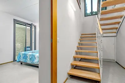 Letto o letti in una camera di Villa Solea, Golfo Aranci