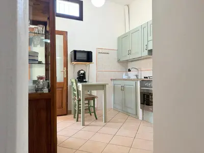 Cucina o angolo cottura di La Calabasa - Villetta a pochi passi dalla spiaggia di Sa Curcurica