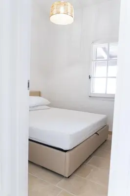 Letto o letti in una camera di La Maison Tamerici