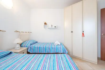 Letto o letti in una camera di AffittaSardegna- Trilo Timone