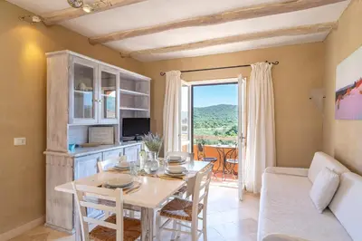 TV o dispositivi per l'intrattenimento presso Relaxing BaiaDeBahas 1BedApt Bilo4 sleeps 4