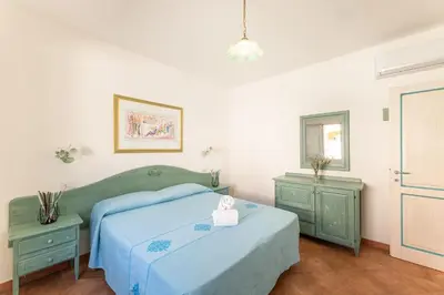 Letto o letti in una camera di Relax at Residenze del Maria Rosaria-1BedApt B3 S3