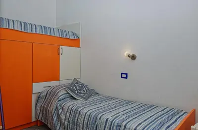 Letto o letti in una camera di Sole e Mare