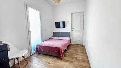 Letto o letti in una camera di Domo Ulleri