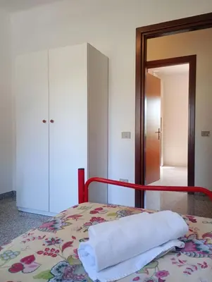 Letto o letti in una camera di The Apricot House, alle porte di San Teodoro