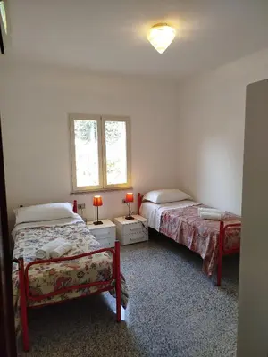 Letto o letti in una camera di The Apricot House, alle porte di San Teodoro