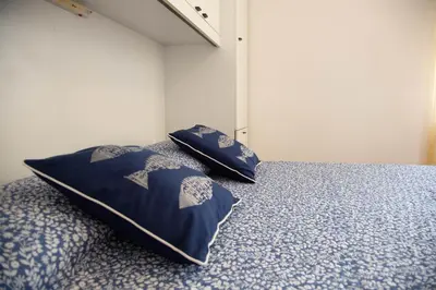 Letto o letti in una camera di Casa Ora Blu - Cala Gonone