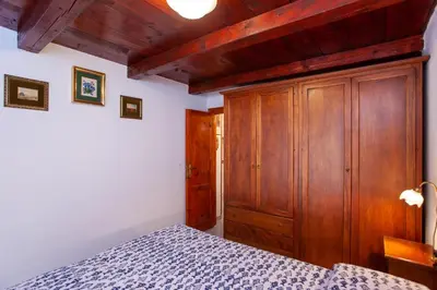 Letto o letti in una camera di Fiori Bilo