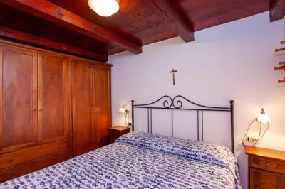 Letto o letti in una camera di Fiori Bilo