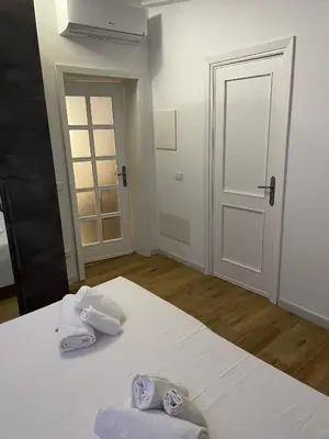 Letto o letti in una camera di Iside Accommodations