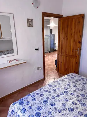 Letto o letti in una camera di Rifugio Tavolara
