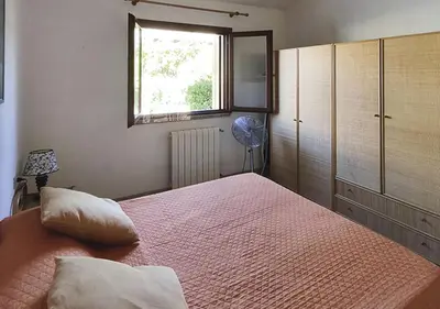 Letto o letti in una camera di Le Maree I Giacinti