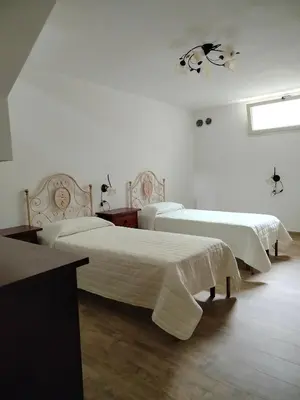 Letto o letti in una camera di Budoni residence Lutturai 2