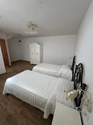Letto o letti in una camera di Budoni residence Lutturai 3