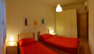Letto o letti in una camera di Apartment with garden