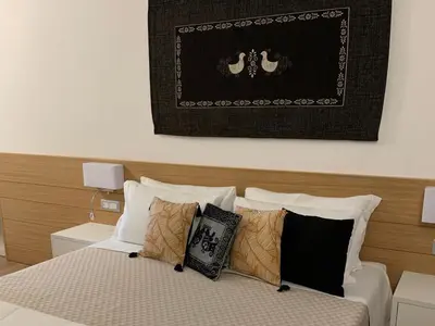 Letto o letti in una camera di Domo Grace