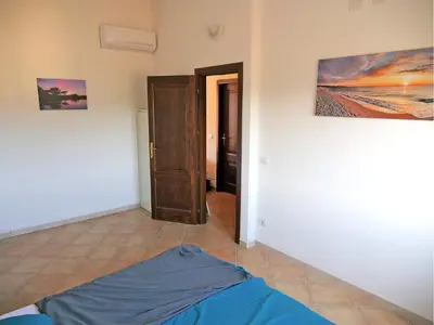 Letto o letti in una camera di Appartamento Estate