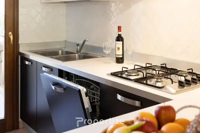 Cucina o angolo cottura di Villetta con idromassaggio e patio by Propertize