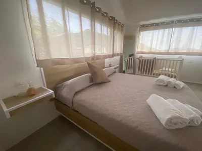 Letto o letti in una camera di Casa Matteo