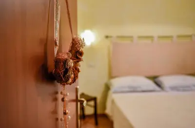 Letto o letti in una camera di Giardino dei Limoni Rooms