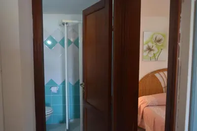 Letto o letti in una camera di Casa Lantana