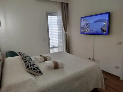 TV o dispositivi per l'intrattenimento presso Central Apartment Olbia-San Simplicio