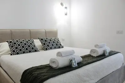 Letto o letti in una camera di Central Apartment Olbia-San Simplicio