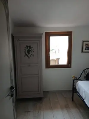 Letto o letti in una camera di Ottiolu House villa 50m from beach