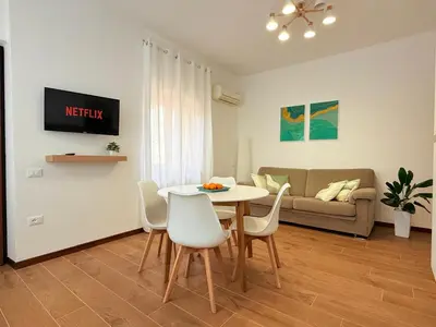 TV o dispositivi per l'intrattenimento presso Le Solero - Appartamento in posizione strategica a Orosei