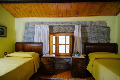 Letto o letti in una camera di B&B San Michele