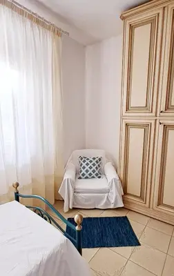 Letto o letti in una camera di Casa Verdi Telti
