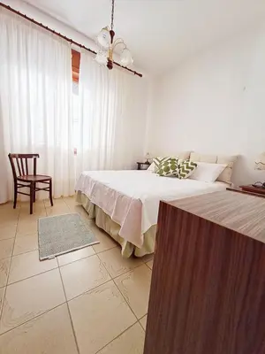 Letto o letti in una camera di Casa Verdi Telti
