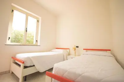 Letto o letti in una camera di Oasi di Luce