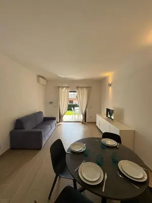 Area soggiorno di Porto San Paolo Nature Apartment
