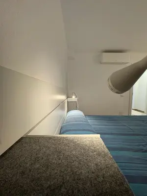 Letto o letti in una camera di Porto San Paolo Nature Apartment