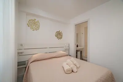 Letto o letti in una camera di Domo de Centro, centro di Olbia