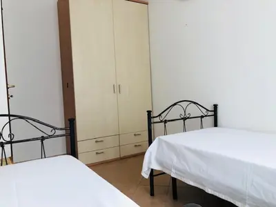 Letto o letti in una camera di Trilocale delle Bouganville