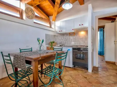 Cucina o angolo cottura di ISA - Apartment 4 beds in Golfo Aranci just 150 mt from the sea