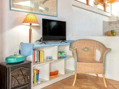 TV o dispositivi per l'intrattenimento presso ISA - Apartment 4 beds in Golfo Aranci just 150 mt from the sea