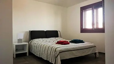 Letto o letti in una camera di Casa Vistamare