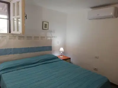 Letto o letti in una camera di Casetta sul Mare