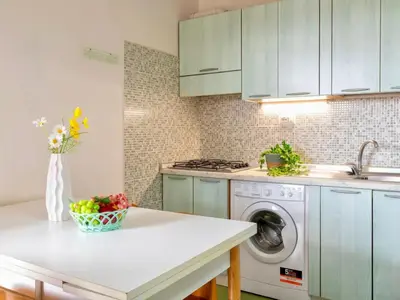 Cucina o angolo cottura di ISA - Apartment 6 beds in Golfo Aranci just 150 mt from the sea